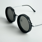 Lunettes Solaires à Teinte Réglable – Élégance et Protection Instantanée